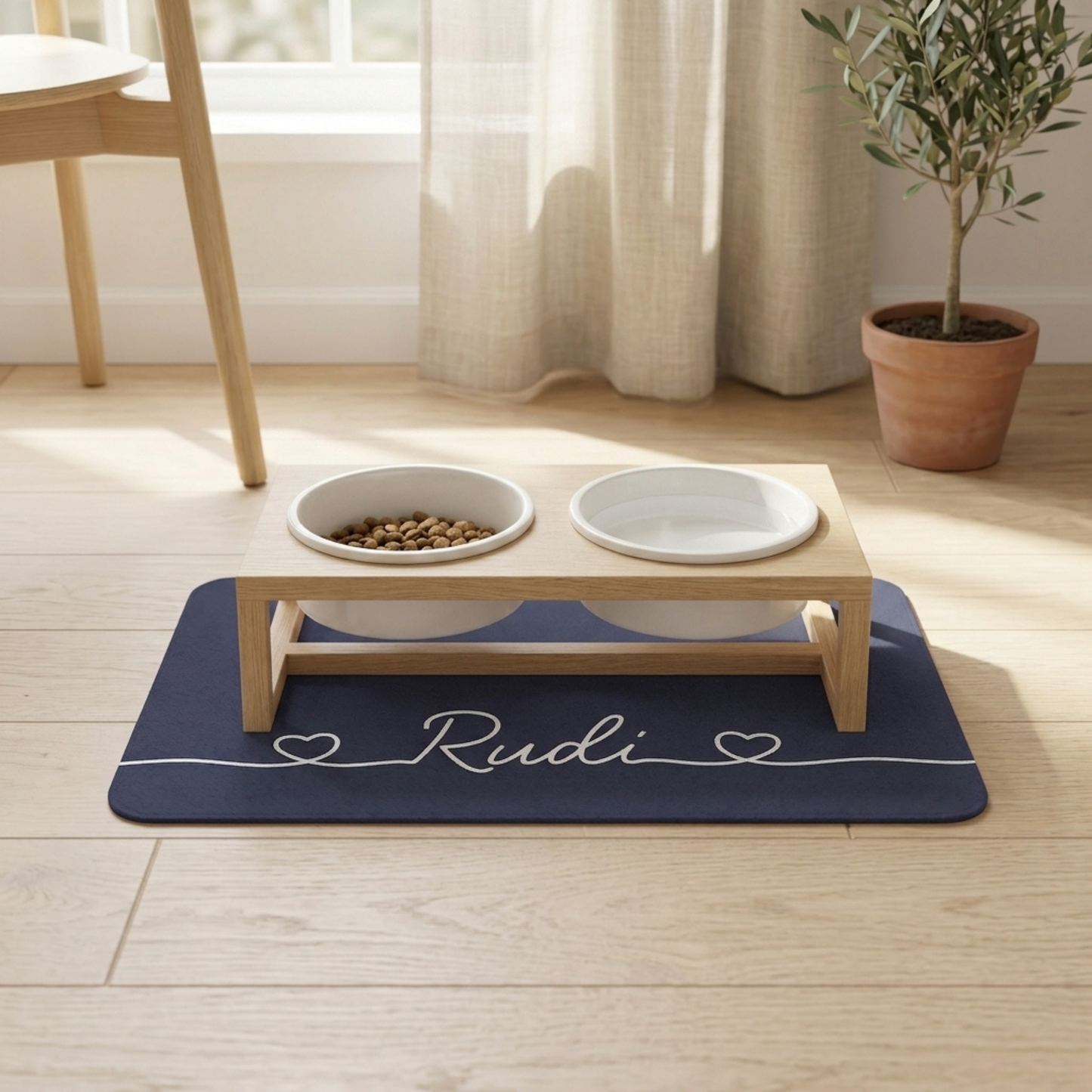 Pet feeding station with elevated bowls on a blue dog food mat in a room with a window and plant.