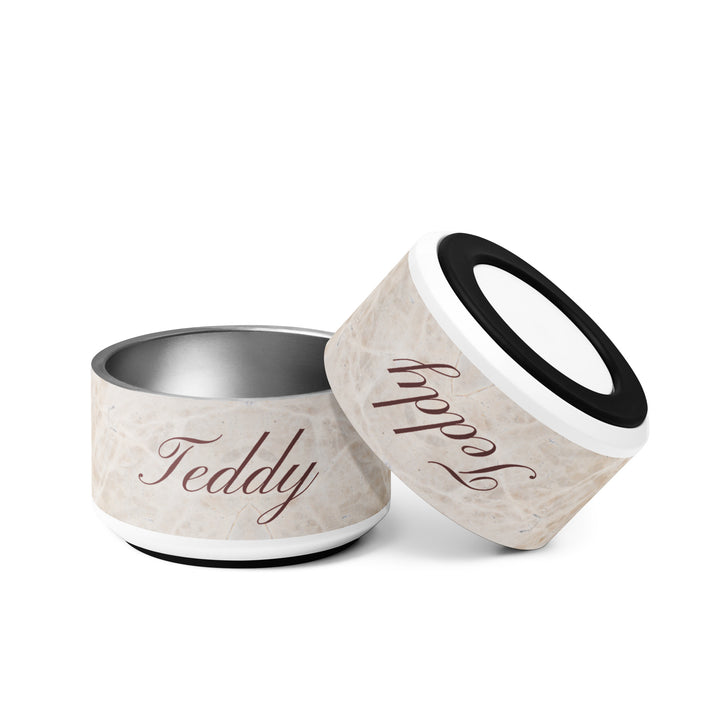 Two 18 oz beige marble personalized dog bowls with the name Teddy