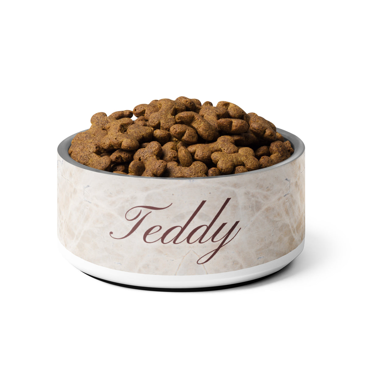Beige marble personalized dog bowl with the name Teddy filled with kibble