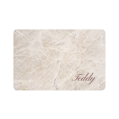 Beige marble rectangle personalized pet food mat with the name Teddy in elegant script