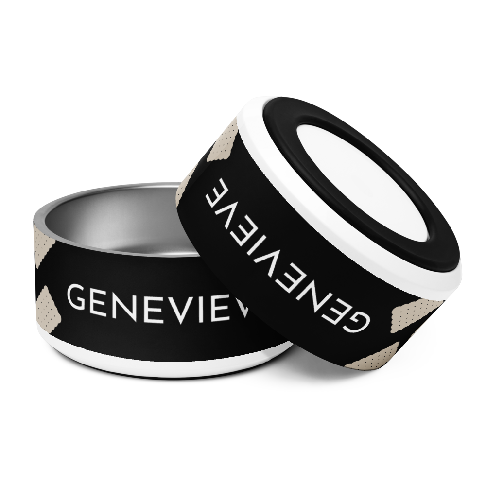 Two large black biscuit personalized dog bowls with the name Genevieve, one tilted to show the rim