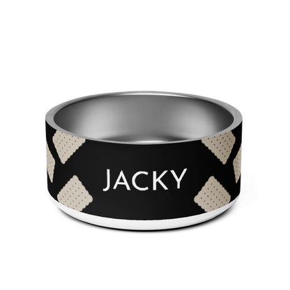 Black biscuit personalized stainless steel dog bowl with the name Jacky in white capitals between sand scalloped cookies