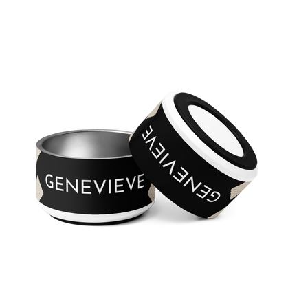 Two black biscuit personalized dog bowls with the name Genevieve, one tilted to show the rim