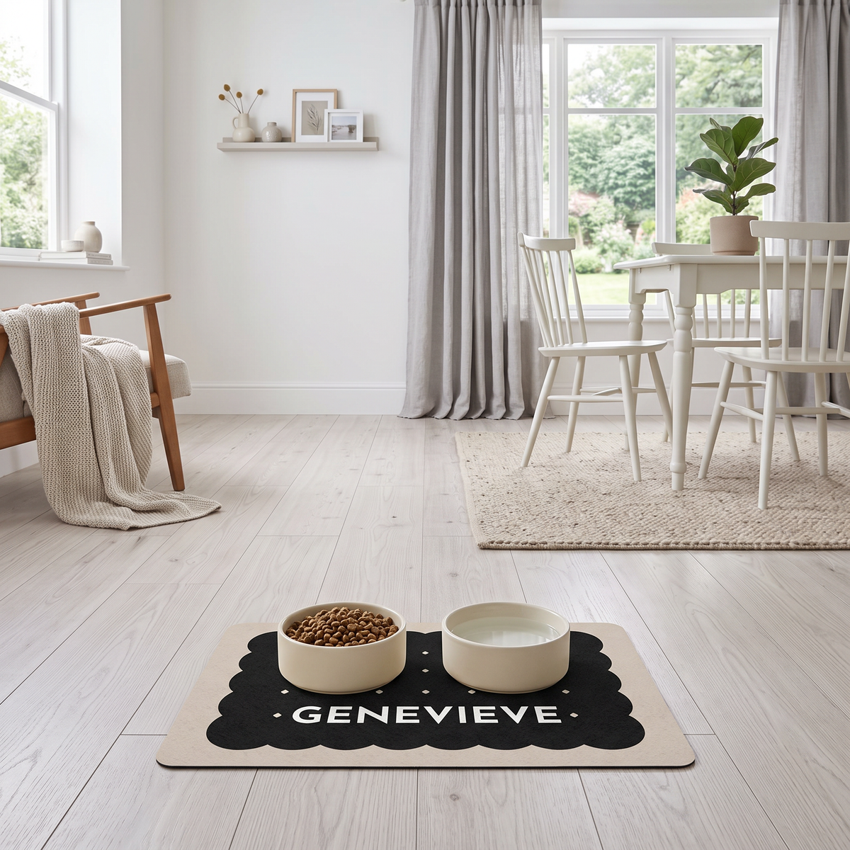 Black biscuit personalized dog food mat with bowls in a bright modern home