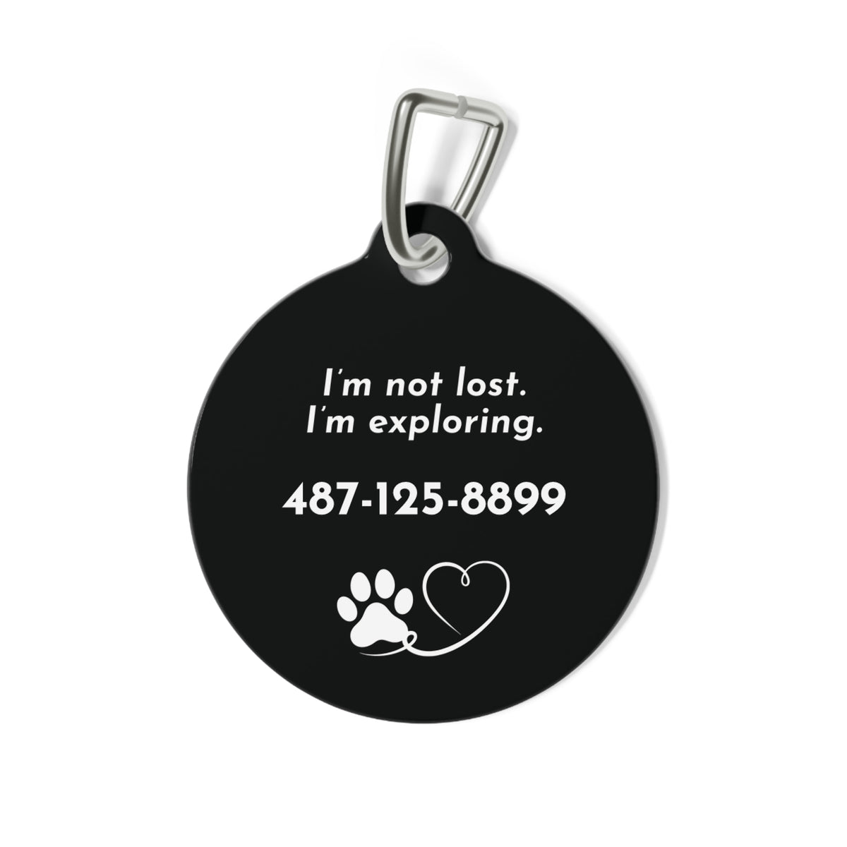 Back of black modern personalized dog tag with I'm not lost. I'm exploring., phone number and a paw and heart