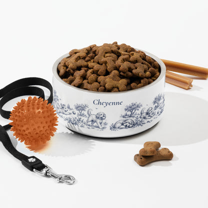 Large blue dog toile personalized dog bowl with kibble, a leash, a ball and dog treats