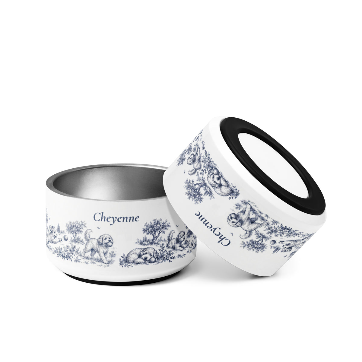 Two blue dog toile personalized dog bowls with the name Cheyenne, one tilted to show the rim