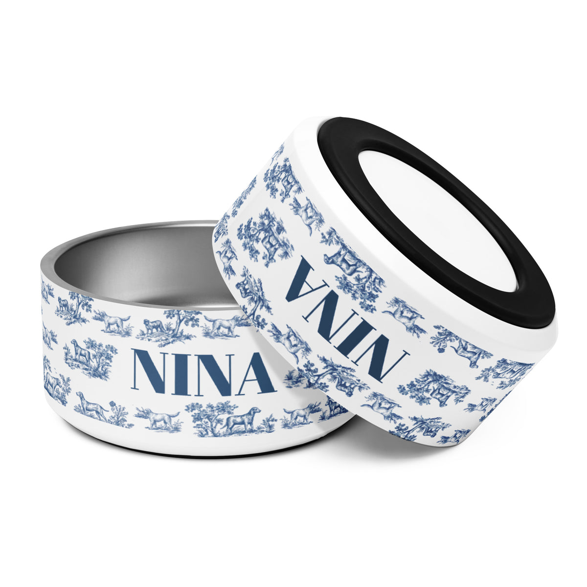 Two 32 oz blue toile personalized dog bowls tilted together showing the name Nina and the non-slip base