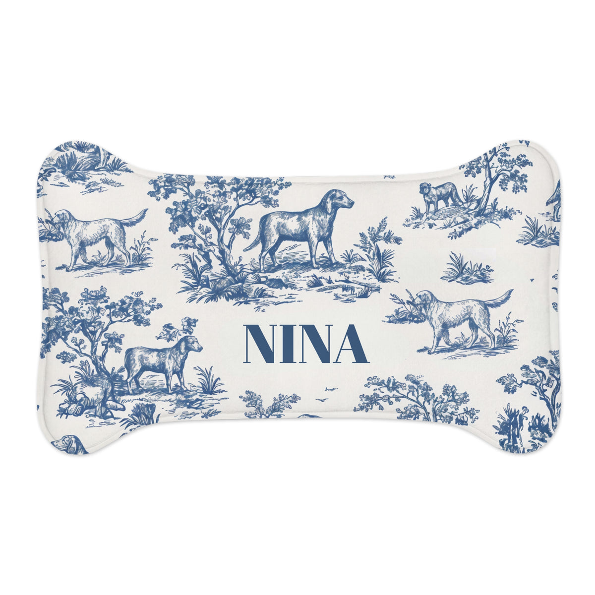 Small blue toile bone-shaped personalized pet feeding mat with the name Nina
