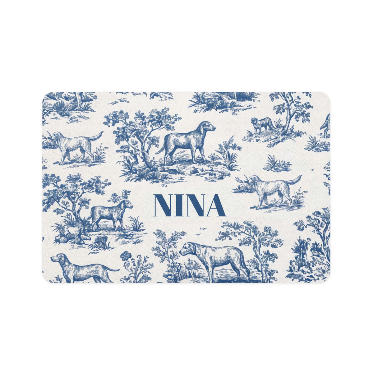 Blue toile personalized pet food mat with dogs in a classic toile landscape and the name Nina
