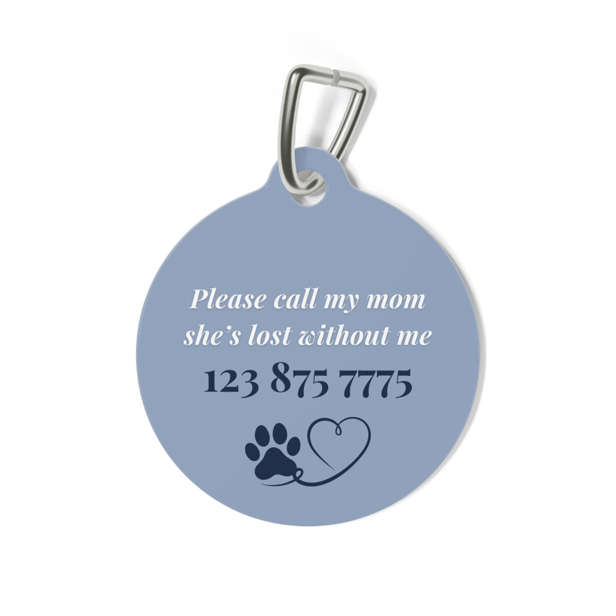 Back of the blue pet tag with printed contact message, a paw print and a heart