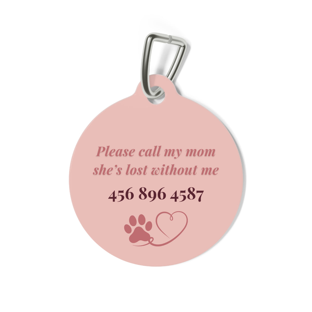 Back of the blush heart pet tag with phone number and paw heart