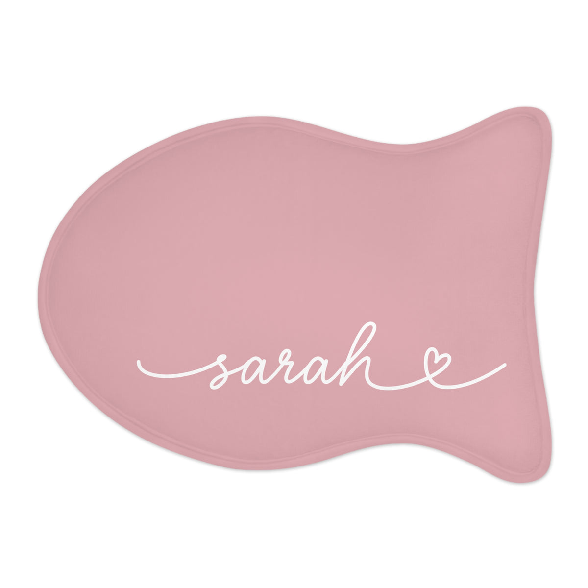 Blush pink fish-shaped personalized pet feeding mat with the name Sarah in white handwritten script