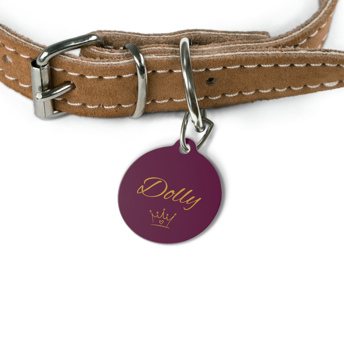 Burgundy crown pet tag on a tan leather collar