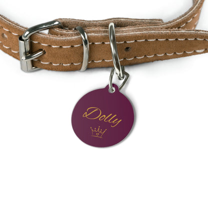 Burgundy crown pet tag on a tan leather collar