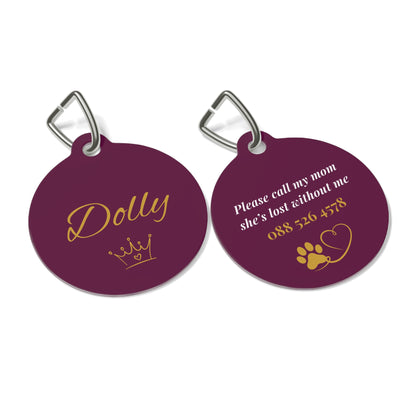Front and back of the burgundy crown personalized pet tag with engraved contact details
