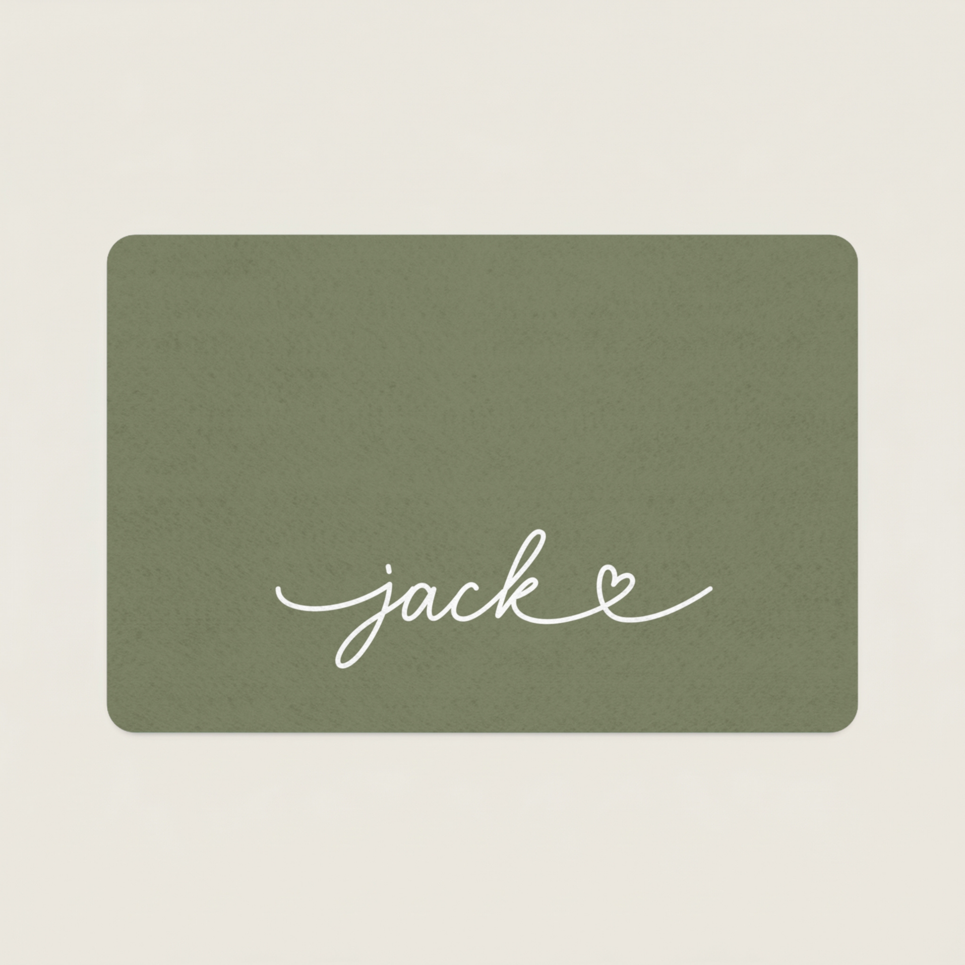 Custom Green dog food mat with 'jack' written on it