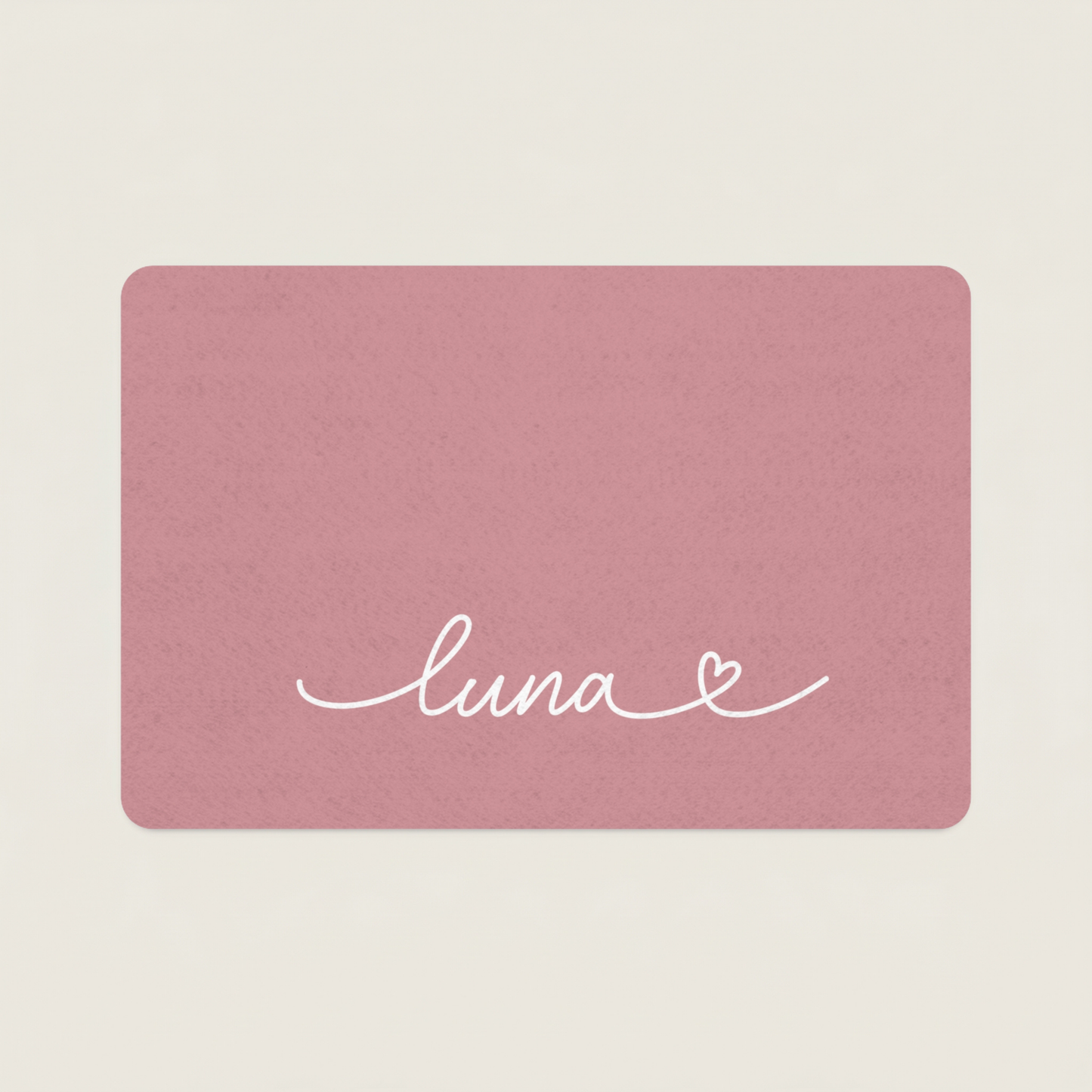 Custom Pink dog food mat with 'luna' and a heart design on a beige background