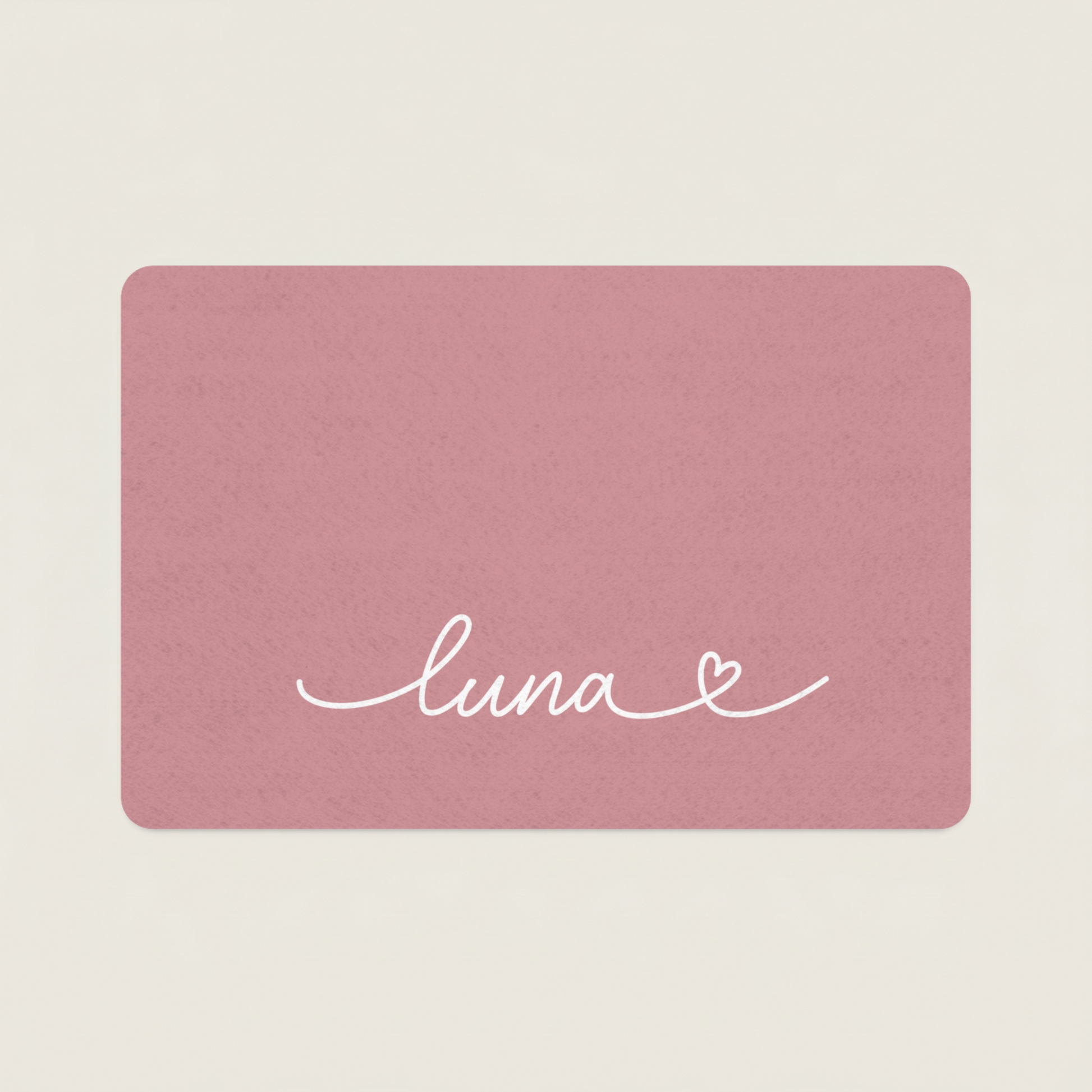 Custom Pink dog food mat with 'luna' and a heart design on a beige background