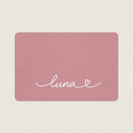 Custom Pink dog food mat with 'luna' and a heart design on a beige background