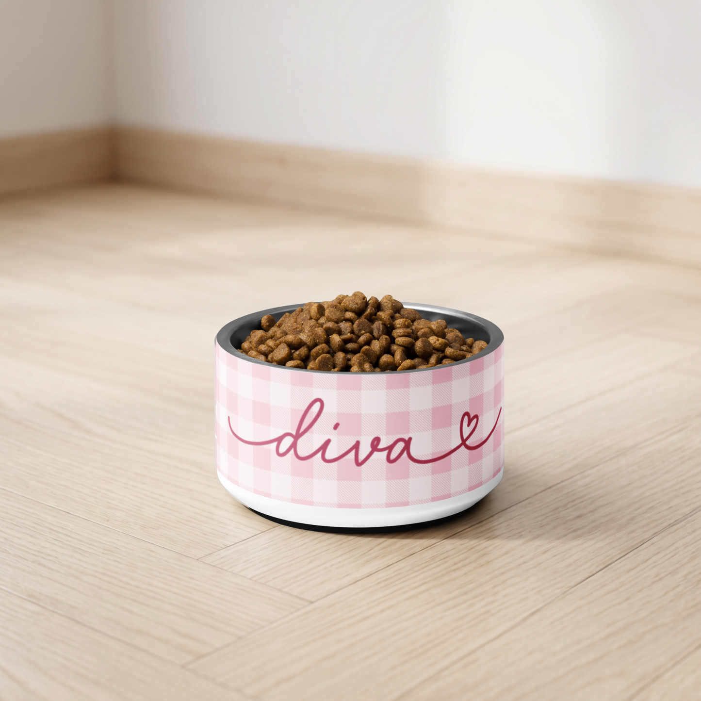 Personalized pink checkered dog bowl with kibble by window - lifestyle