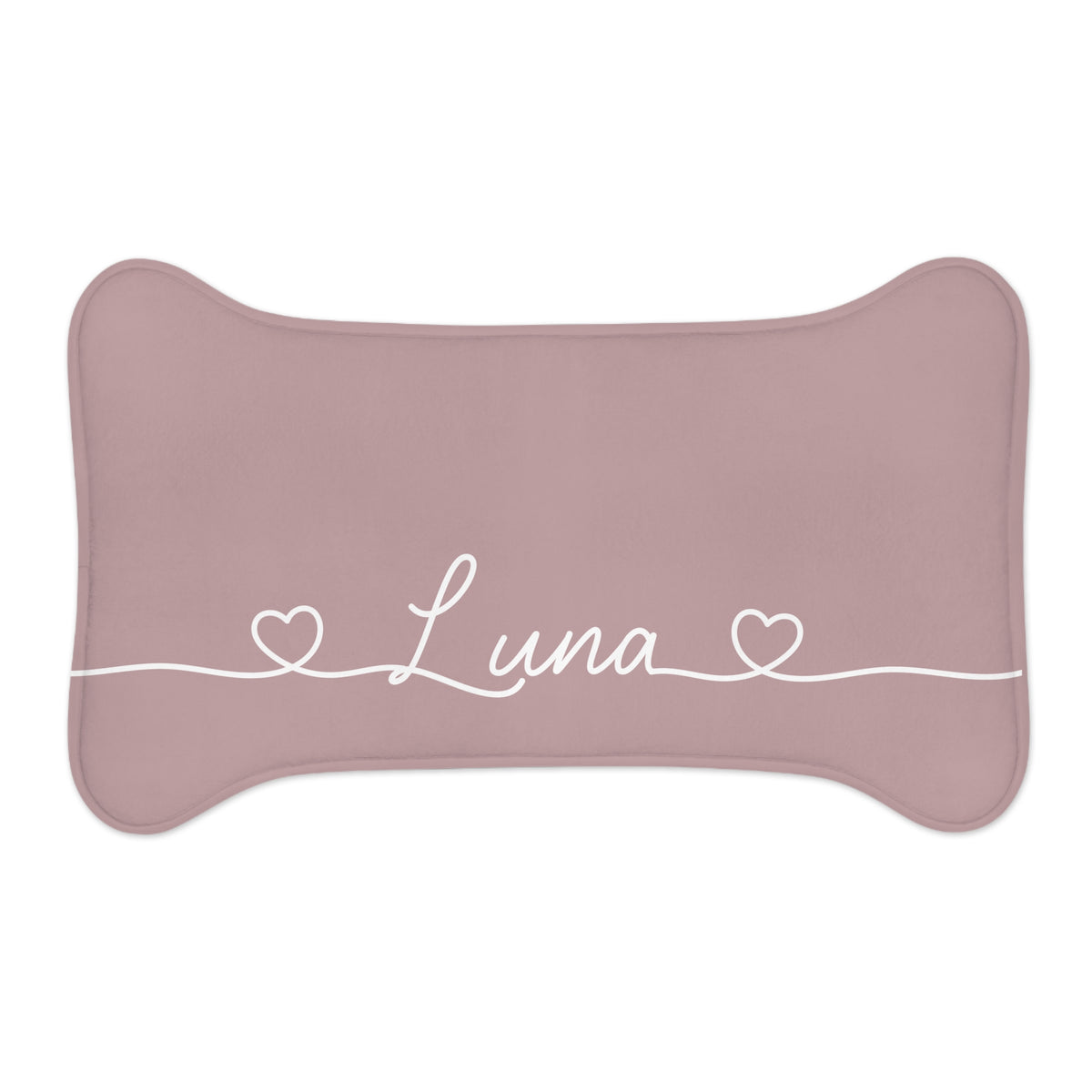 Small dusty rose bone-shaped personalized feeding mat with the name Luna between two hearts