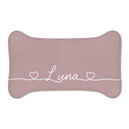 Small dusty rose bone-shaped personalized feeding mat with the name Luna between two hearts