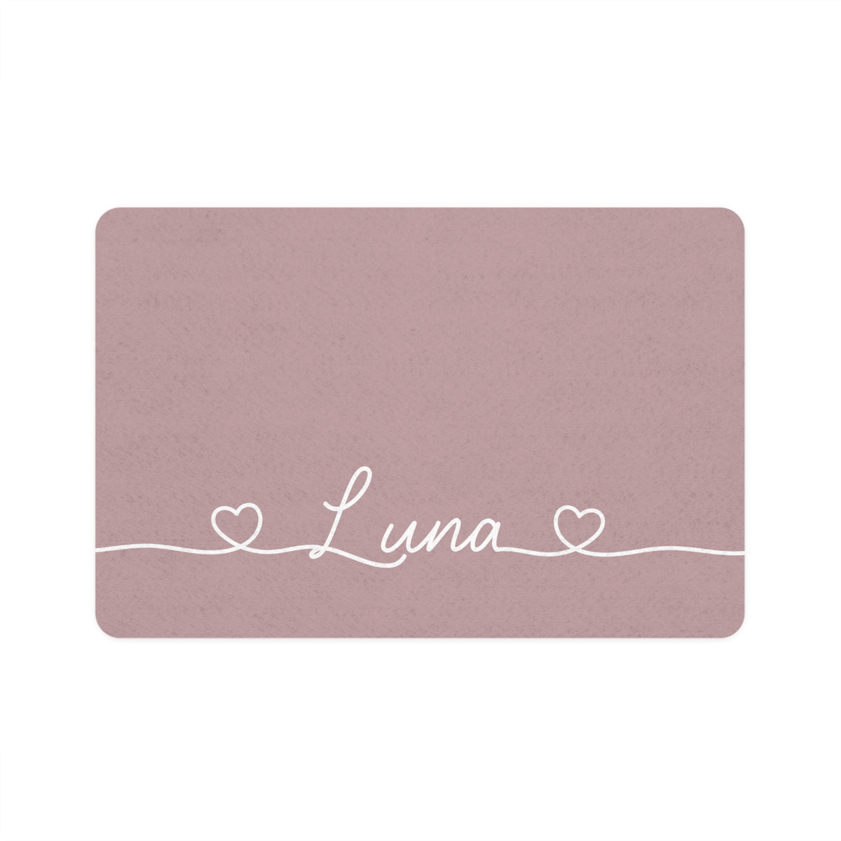 Dusty rose rectangle personalized pet food mat with the name Luna in white script between two small hearts