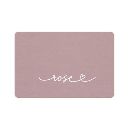 Dusty rose rectangle personalized pet food mat with the name Rose in white handwritten script and a small heart