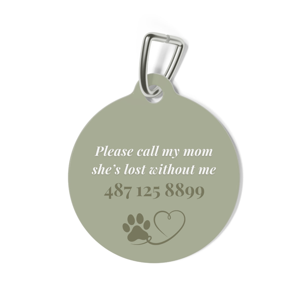 Back of the sage green heart pet tag with phone number and paw heart