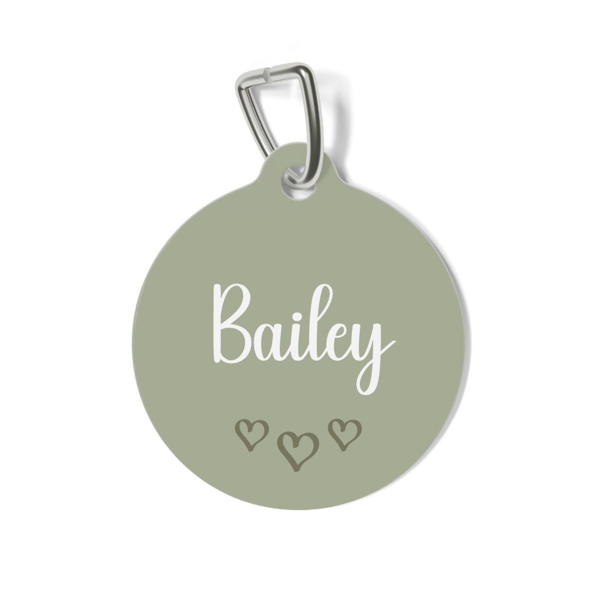 Sage green heart personalized pet tag with the name Bailey in white script and three small hearts
