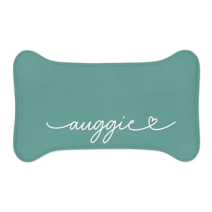 Small jade bone-shaped personalized pet feeding mat with the name Auggie