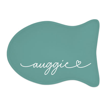 Jade fish-shaped personalized pet feeding mat with the name Auggie in white script
