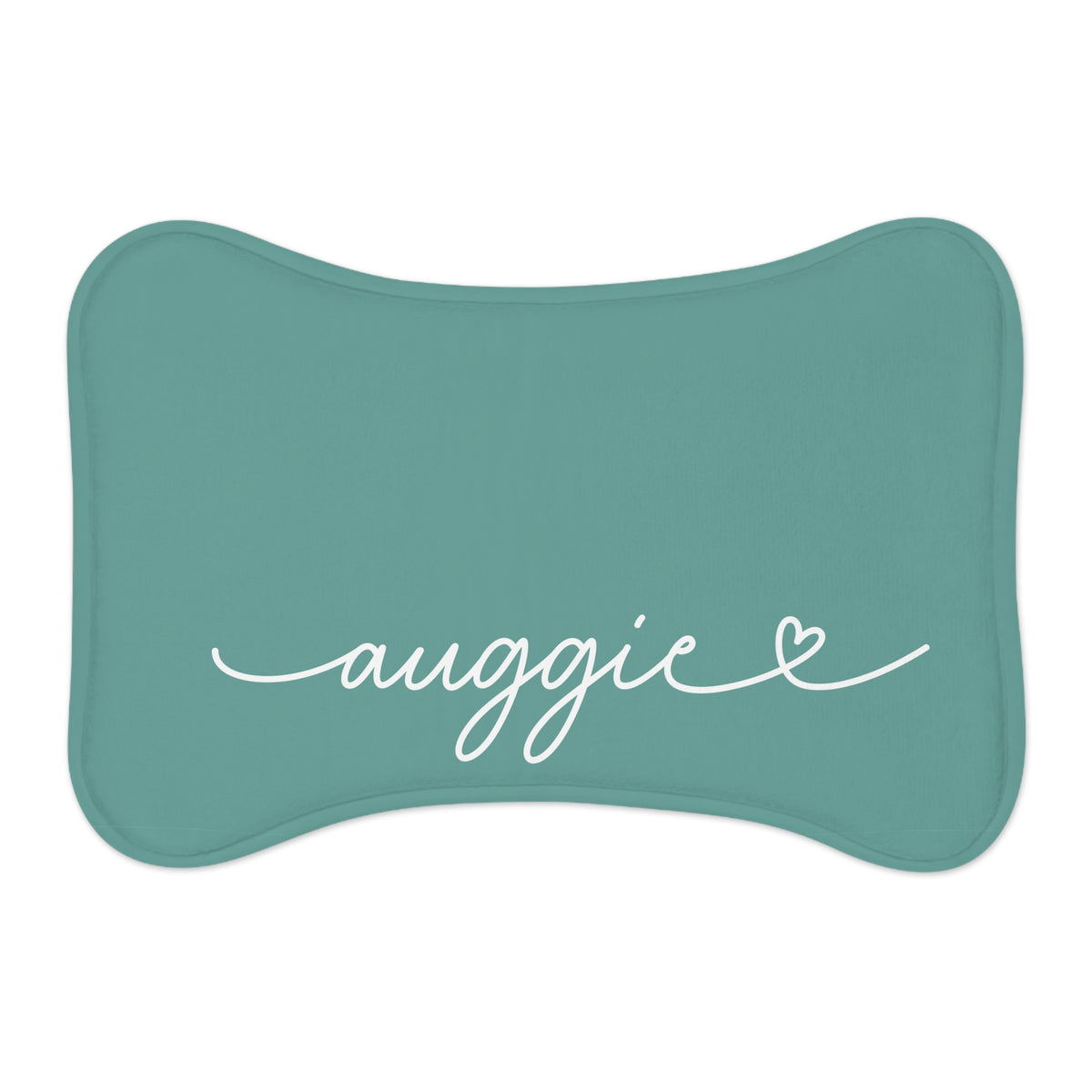 Jade bone-shaped personalized pet feeding mat with the name Auggie in white handwritten script and a small heart