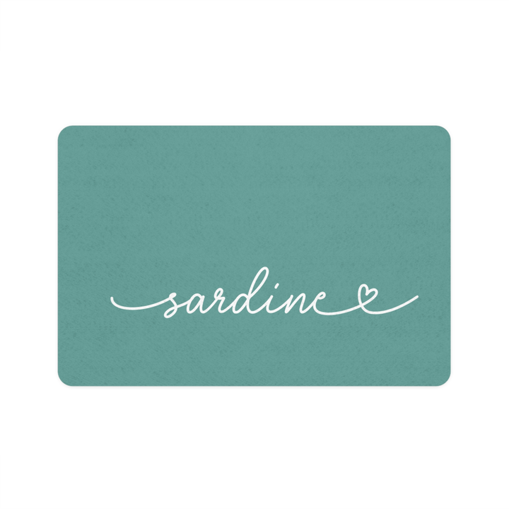 Jade green rectangle personalized pet food mat with the name Sardine in white handwritten script