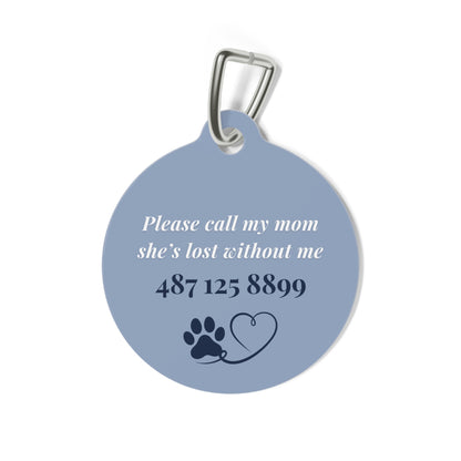 Back of the lavender heart pet tag with phone number and paw heart