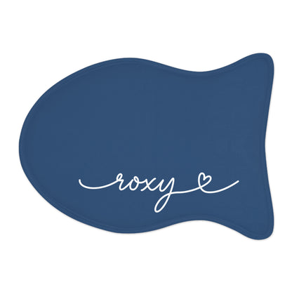 Midnight blue fish-shaped personalized pet feeding mat with the name Roxy in white handwritten script