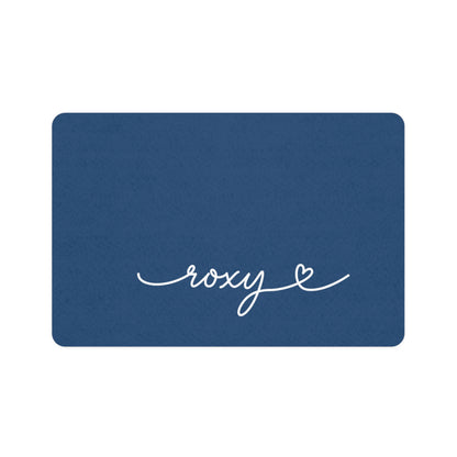 Midnight blue rectangle personalized pet food mat with the name Roxy in white handwritten script and a small heart