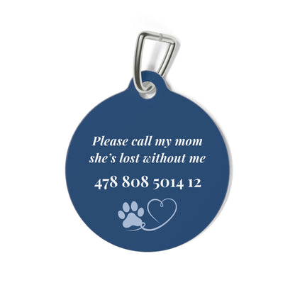 Back of the midnight blue personalized pet tag with a contact message, phone number and paw print with heart