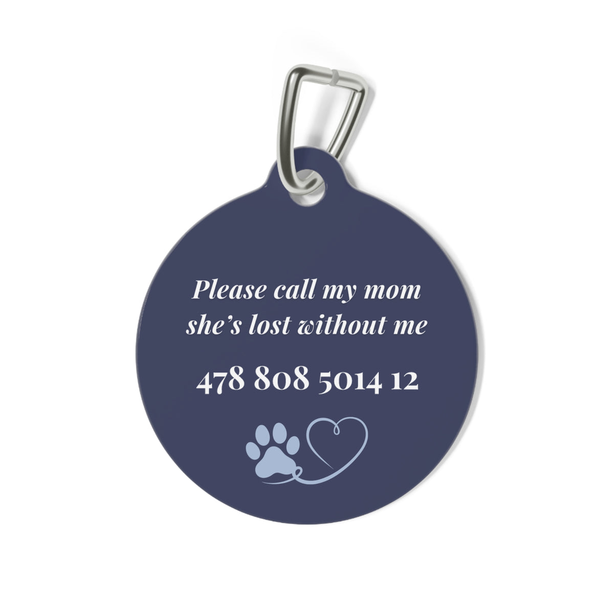 Back of the navy blue personalized pet tag with a contact message, phone number and paw print with heart
