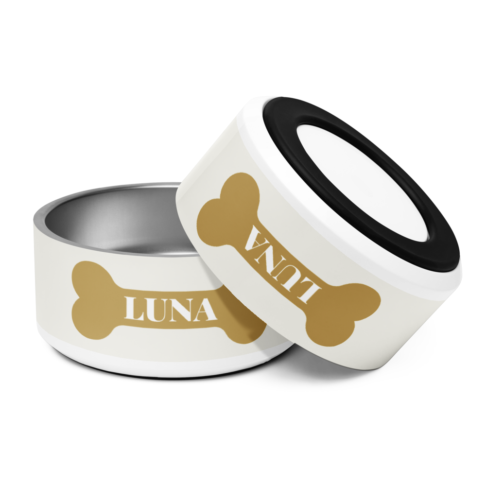Off-white gold bone personalized dog bowl with the name Luna and its removable anti-slip base