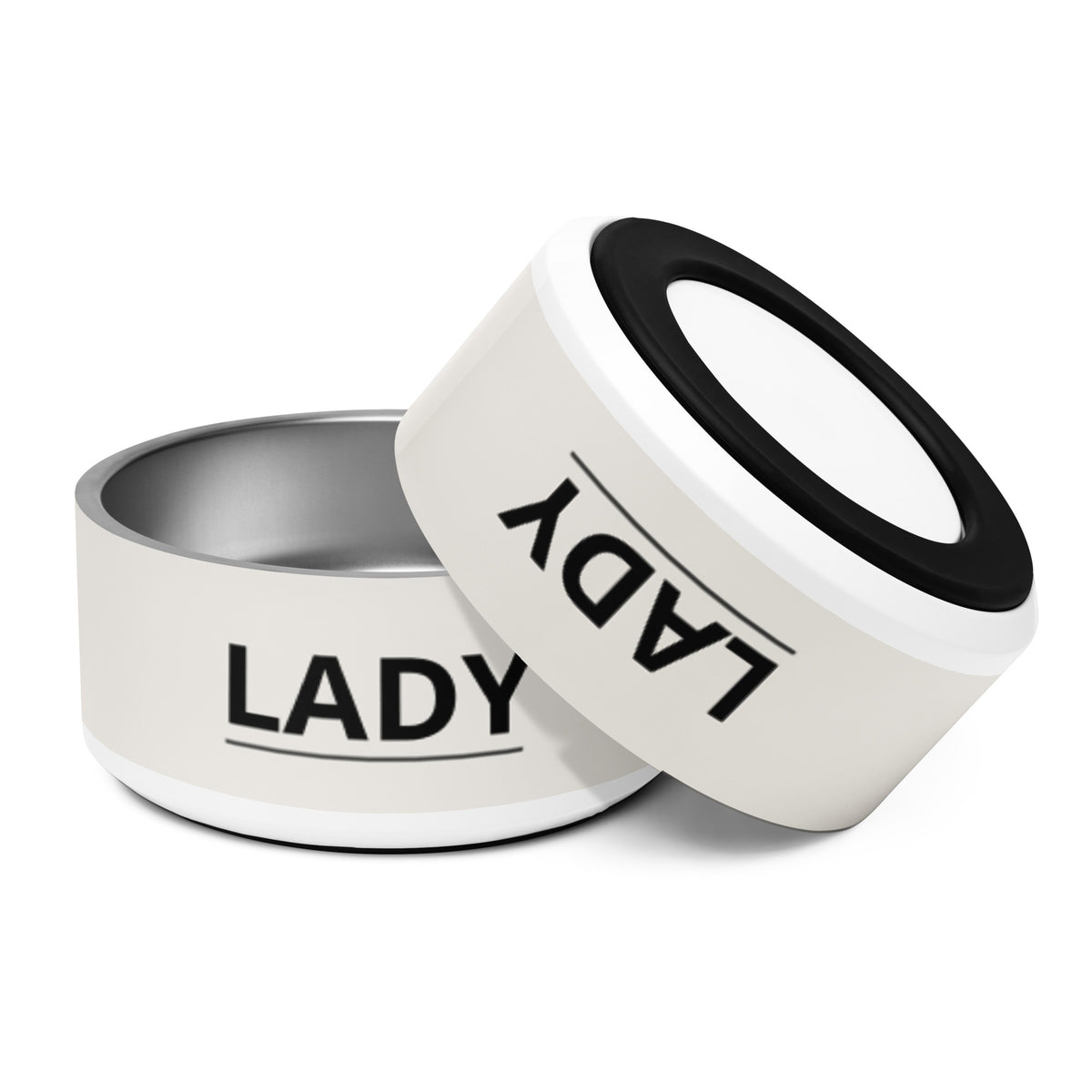 Two large off-white modern personalized dog bowls with the name Lady, one tilted to show the rim