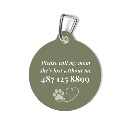 Back of the olive green personalized pet tag with a contact message, phone number and paw print with heart