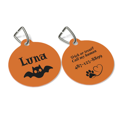 Front and back of orange bat personalized dog tag with name, bat, funny saying and phone number