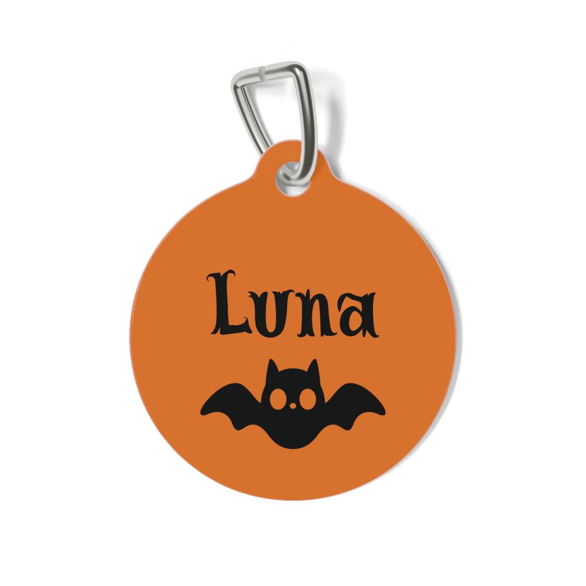 Round orange personalized dog tag with black spooky name lettering and a cute black bat