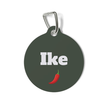 Dark green personalized dog tag with the pet name in white lettering and a red chili pepper