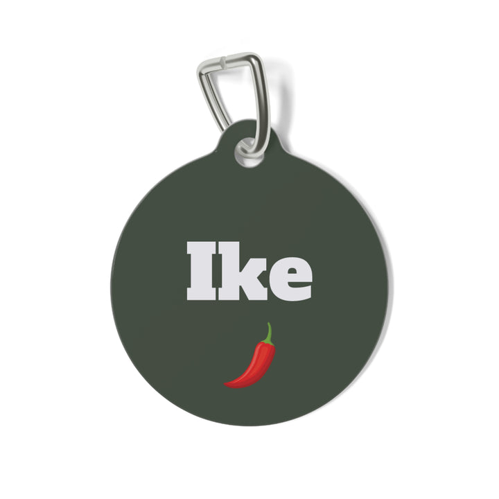 Dark green personalized dog tag with the pet name in white lettering and a red chili pepper