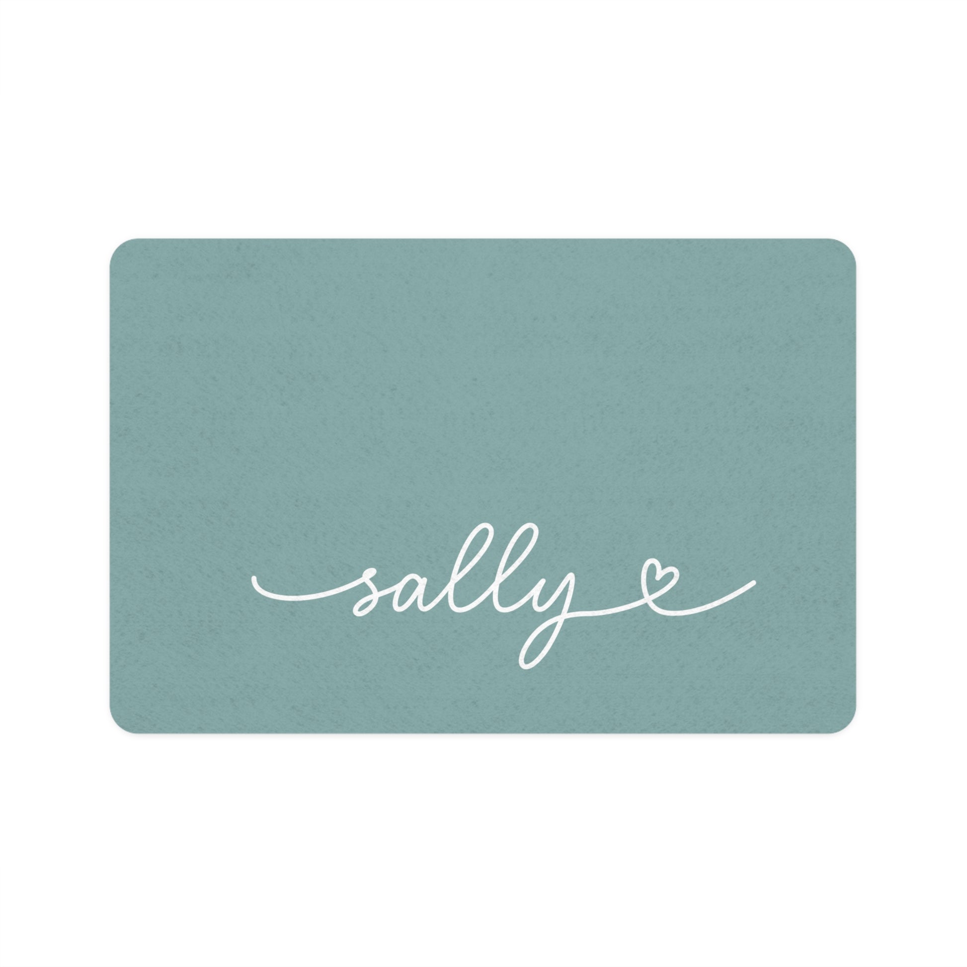 Personalized eucalyptus green dog food mat with pet name in handwritten script