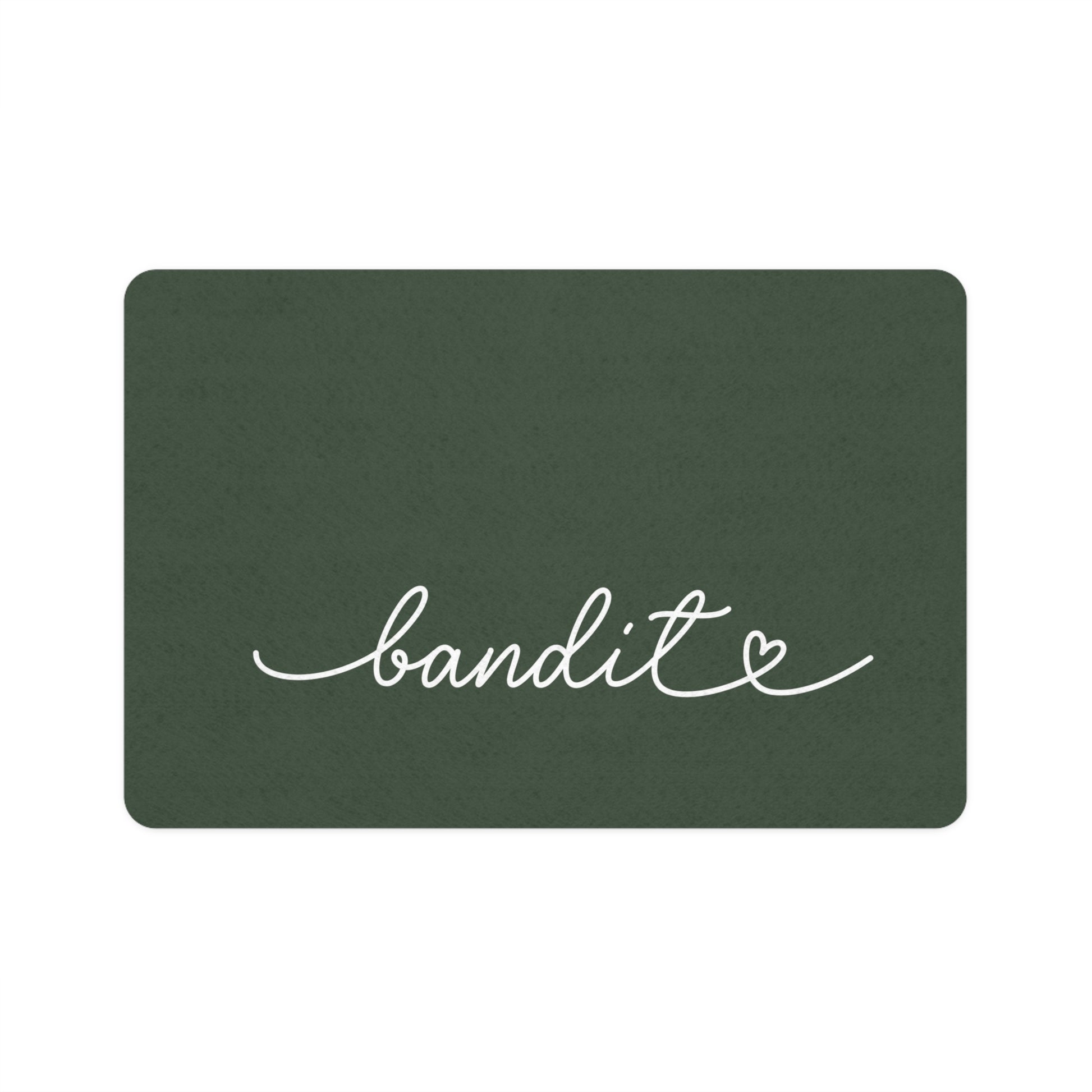 Personalized forest green rectangle dog food mat with pet name in handwritten script