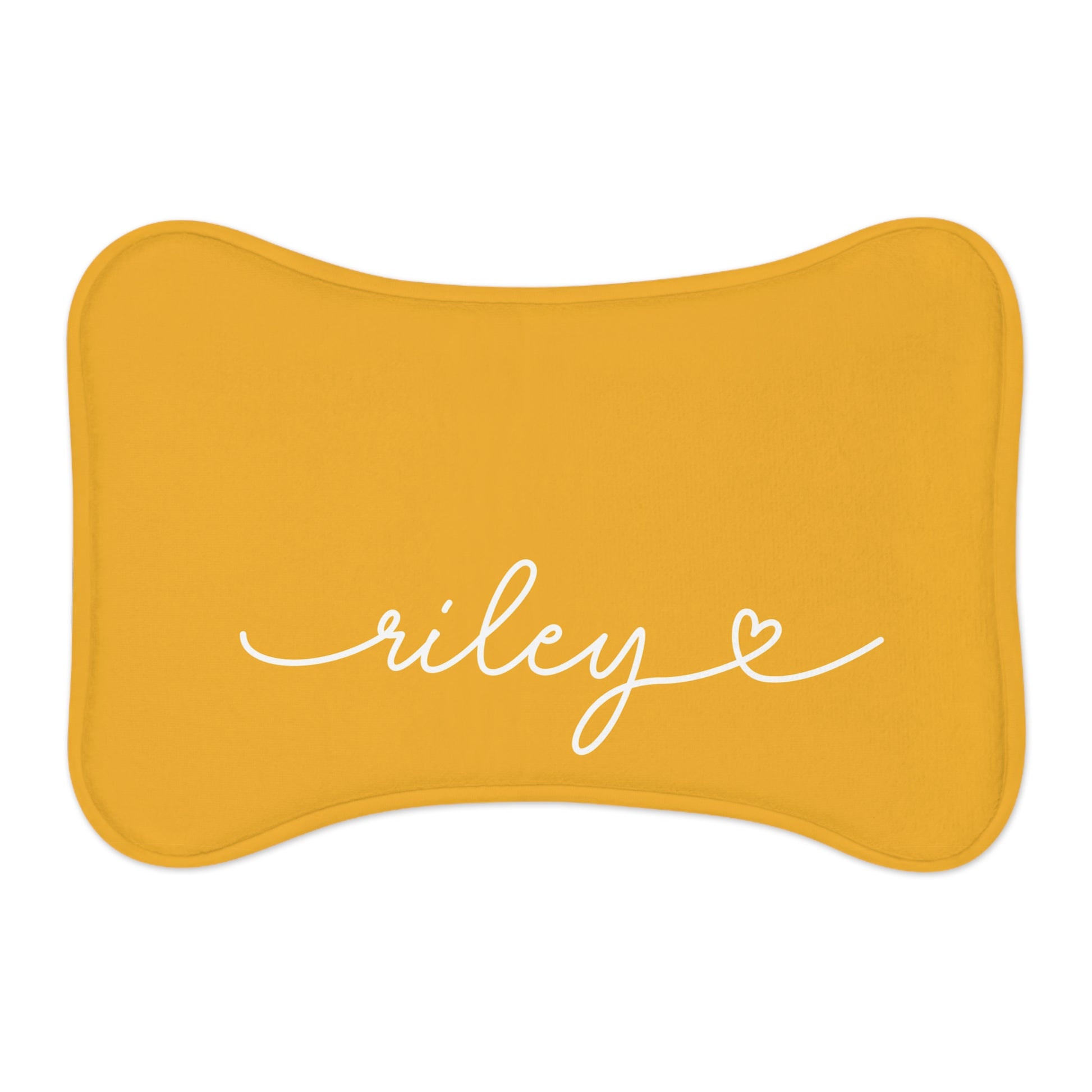 Personalized marigold dog food mat, bone shape, front view with handwritten name